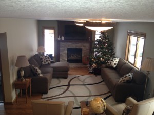 Living room remodel with stone fireplace surround